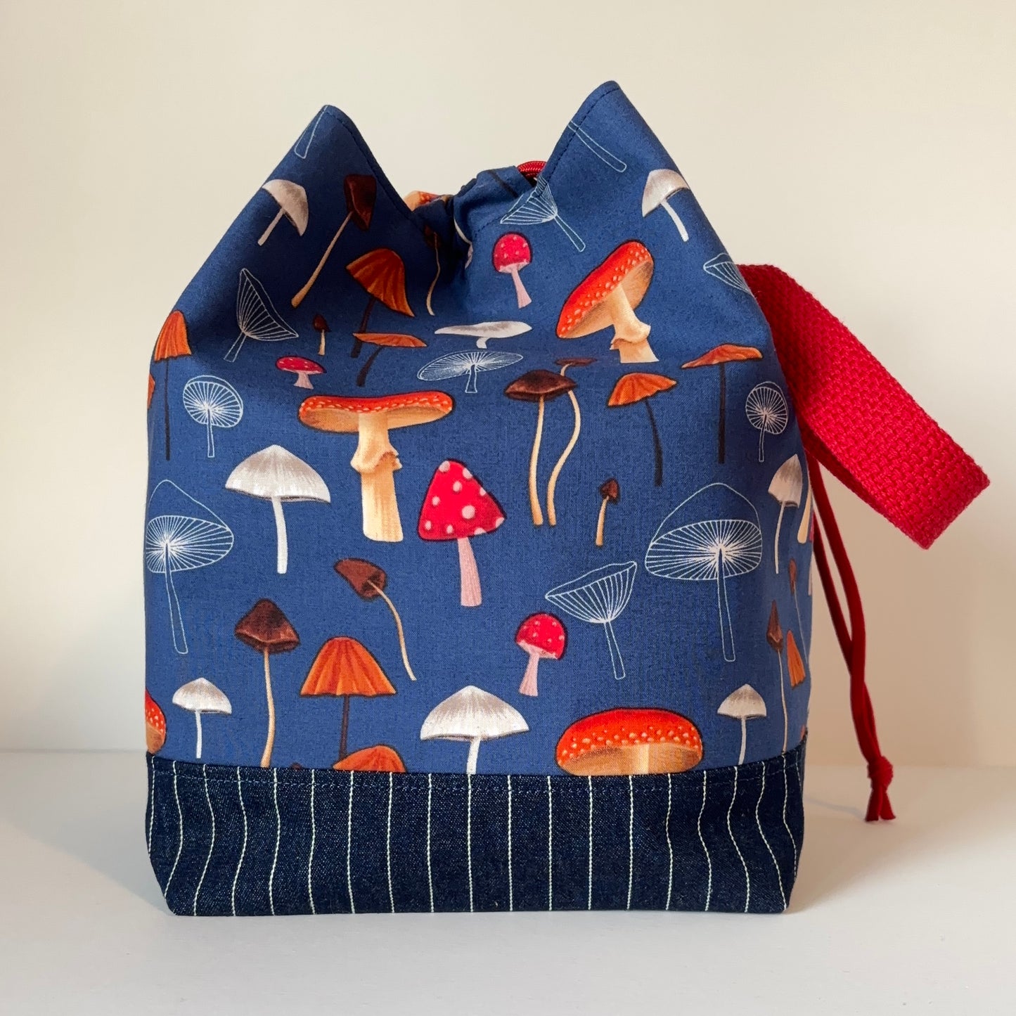 mushrooms on dark blue project bag